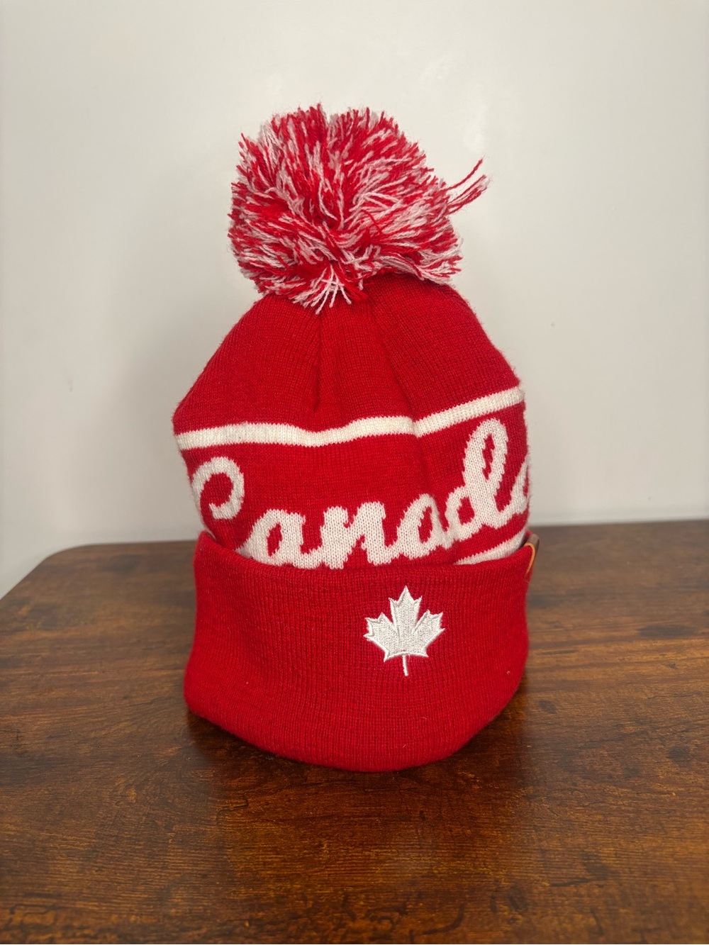 Canada Red Pom Beanie with White Maple Leaf